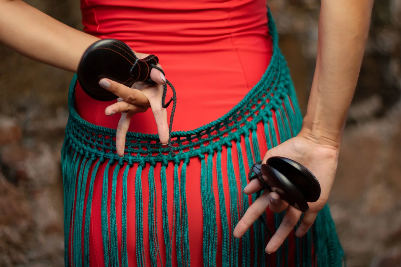 A flamenco dancer in a ruffled dress mid-movement